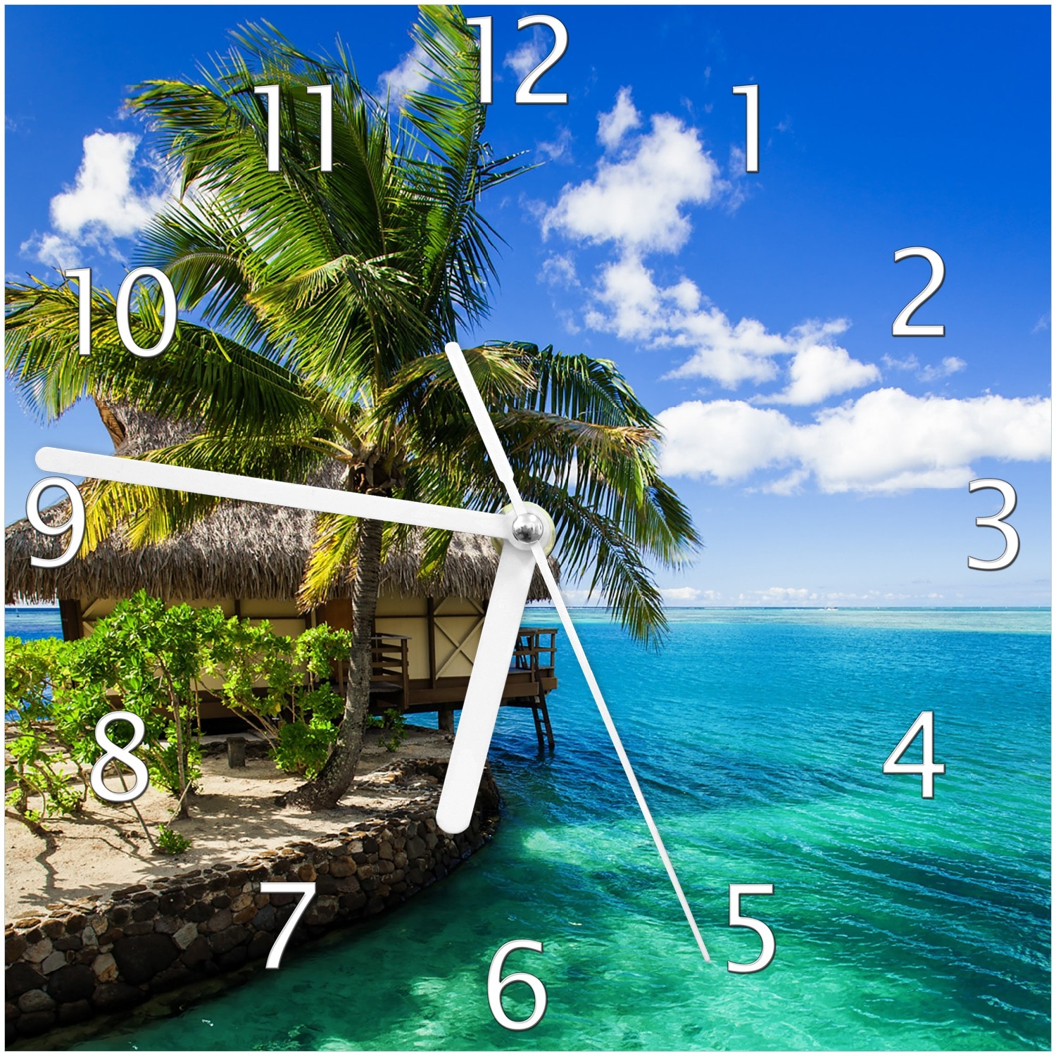 Wallario Uhr 30 x 60 cm, wei&szlig;e Zeiger Karibisches Meer ? Einsame H&uuml;tte unter Palmen 