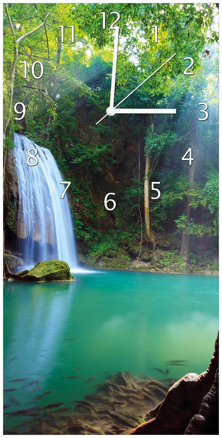 Wallario Uhr 30 x 60 cm, wei&szlig;e Zeiger Wasserfall im Wald am See  Idylle in Thailand 
