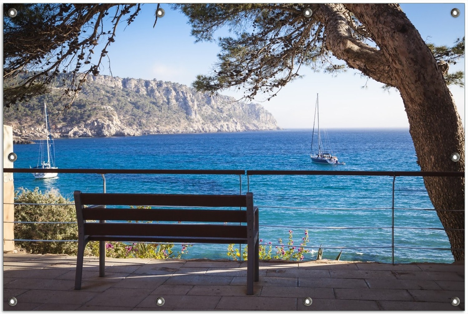 Wallario Gartenposter ca. 120 x 180 cm Einsame Bank am Meer - Spanien im Sommer 